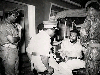 Nigerian officers discussing military strategy during the Nigerian Civil War