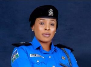 Rivers State; A uniformed Nigerian policewoman speaking at a media briefing 