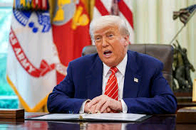 Donald Trump speaking at a press briefing in the White House